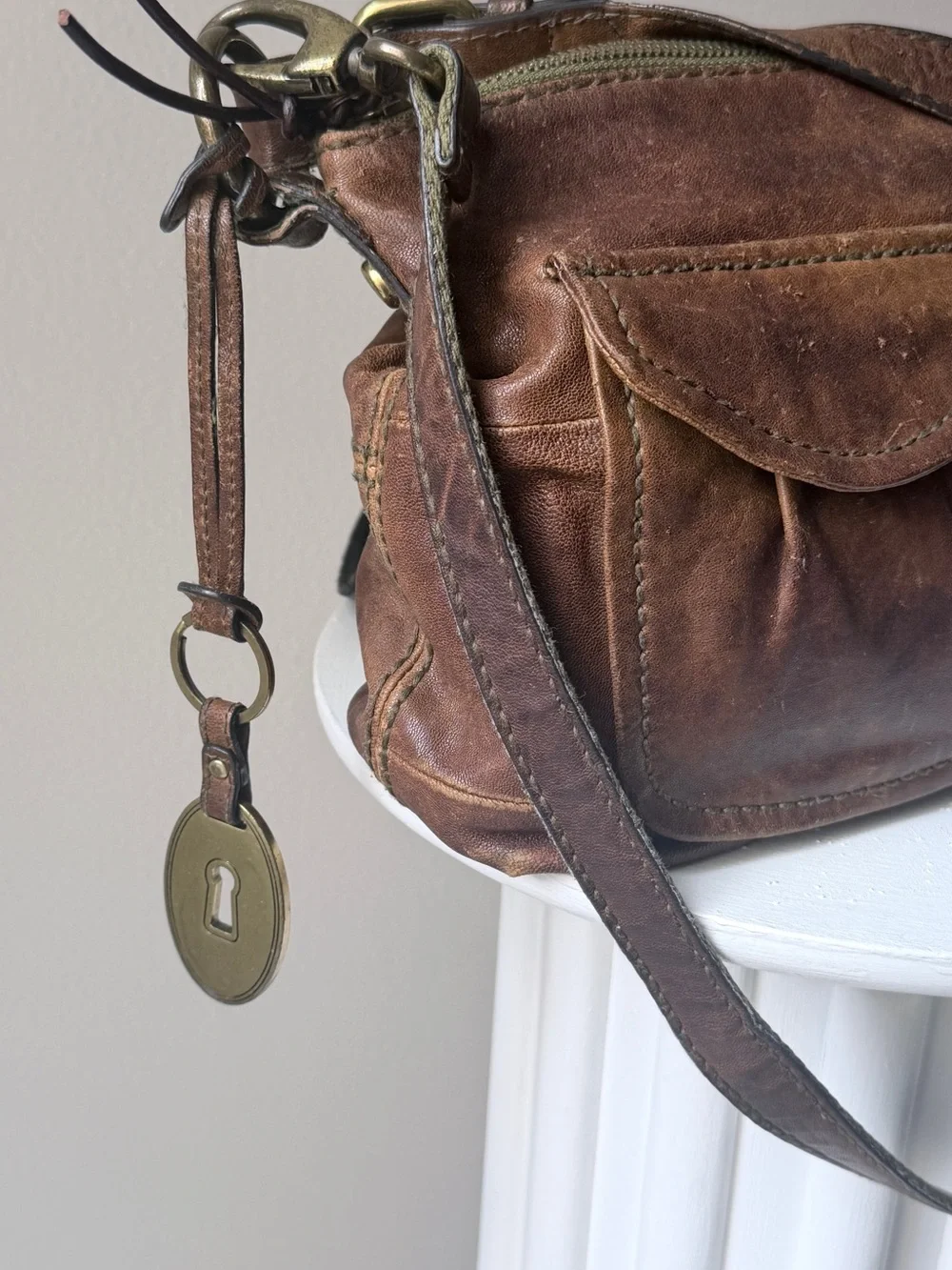 Hyper Distressed Fossil Vintage Bag.